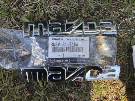 Эмблема(надпись) "Mazda" крышки багажника Mazda BN8V51710A